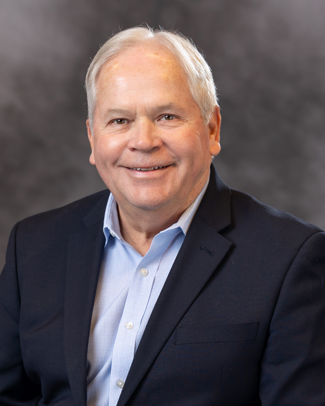 Headshot photo of board member Steven K Pedigo 